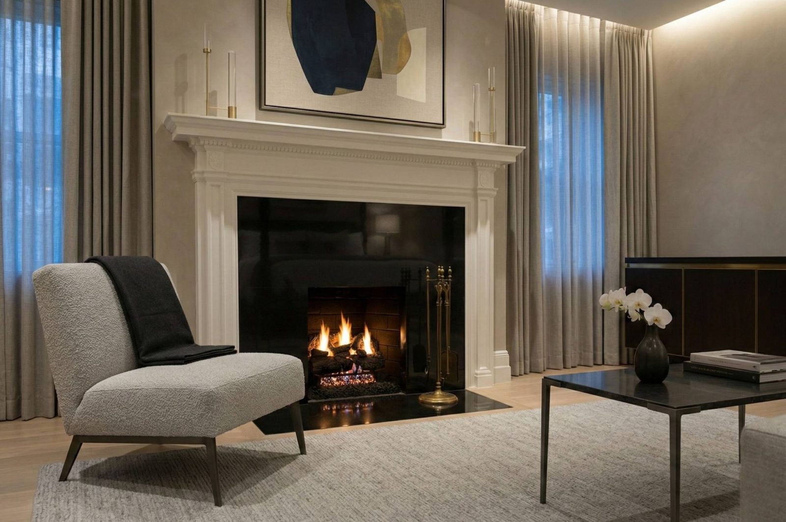 A Real Fyre vented gas log set burning under a classic white mantel